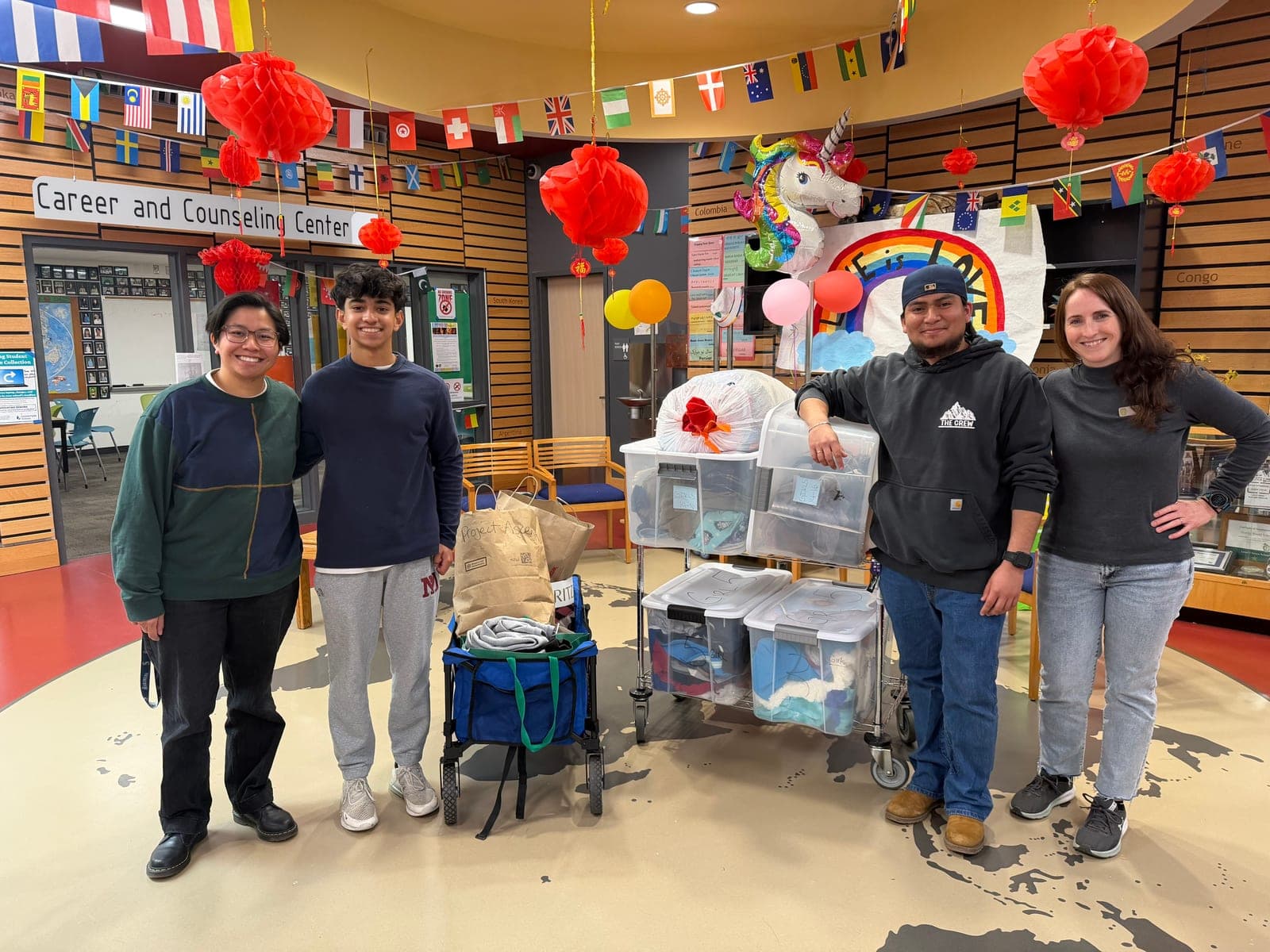 Project Ascend volunteers delivering donations with community partners