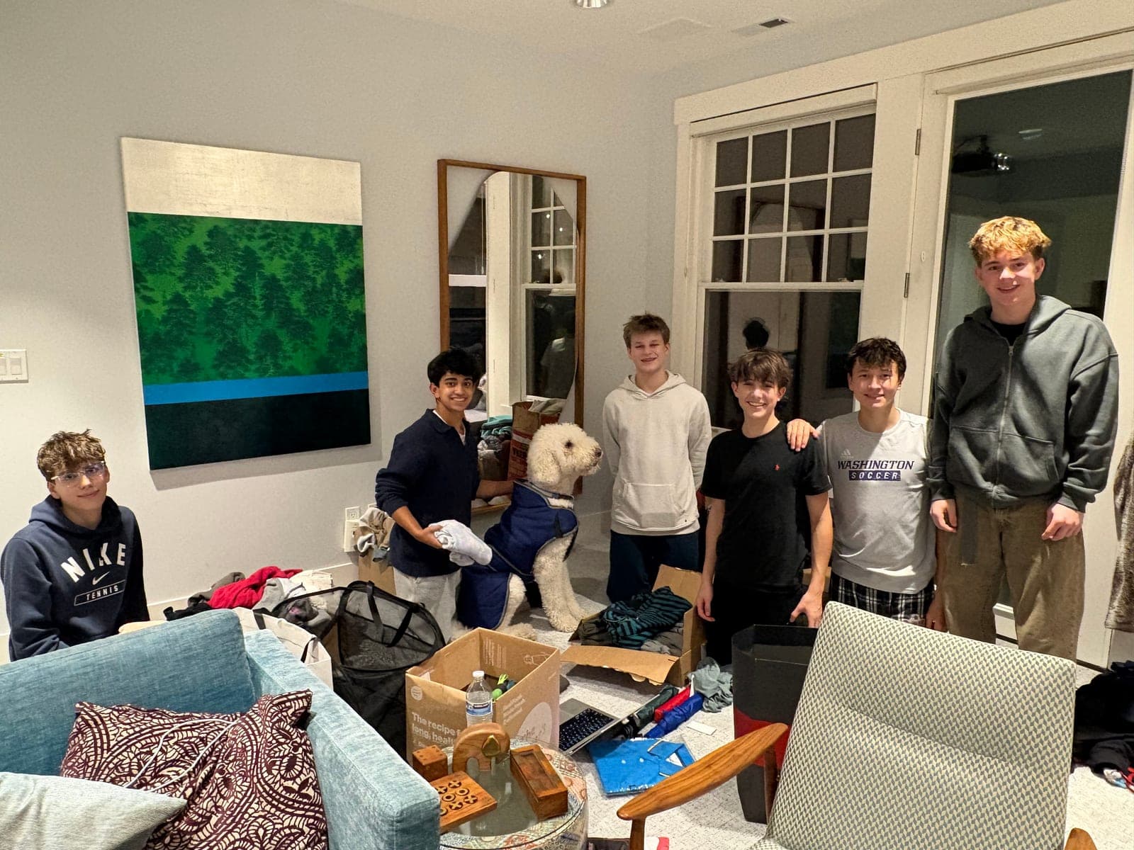 Project Ascend team members gathered during an early donation sort